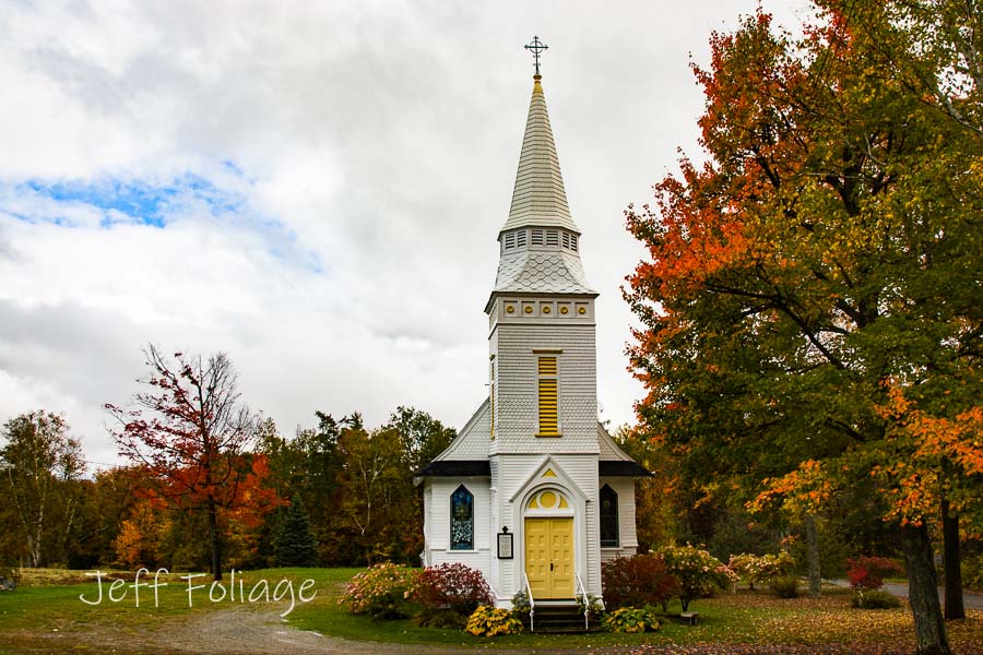 fall colors around ST Matthews Church in Sugar Hill NH