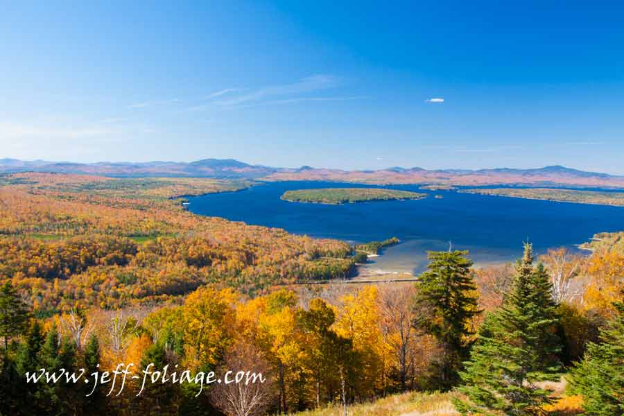 New England fall foliage stretching as far as the eye can see in Rangeley Lake Maine