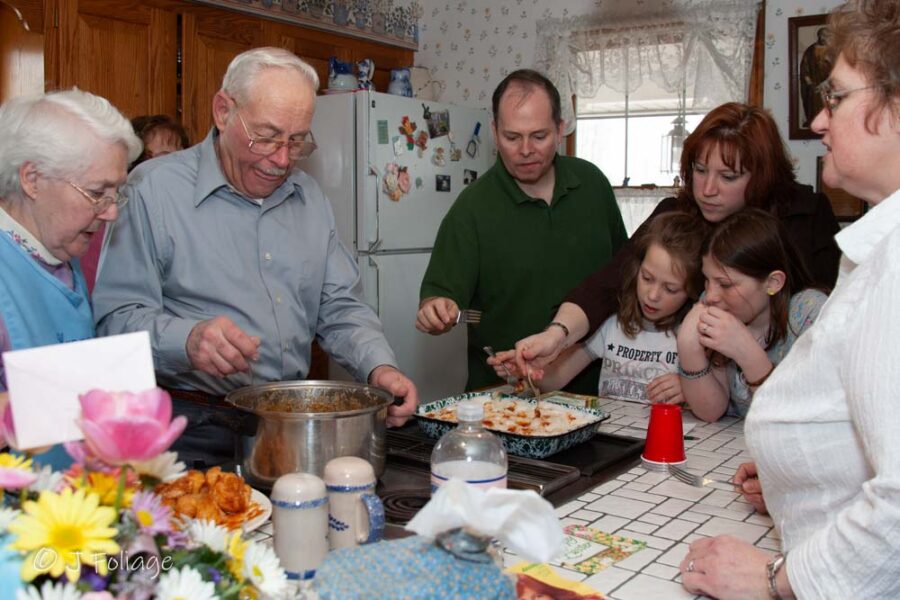 The family gathers for a Norman Rockwell moment to drizzle the thickened maple syrup over a pan of fresh snow.