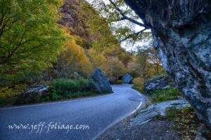 Hairpin turn in Vermonts Smuggler's Notch under New England fall foliage