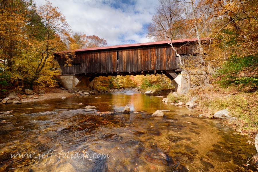 Reflection under the Durgin Bridge surrounded by the fall colors