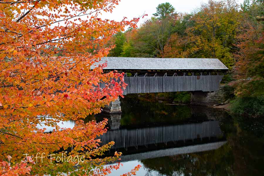 parsonsfield porter covered bridge in orange fall colors