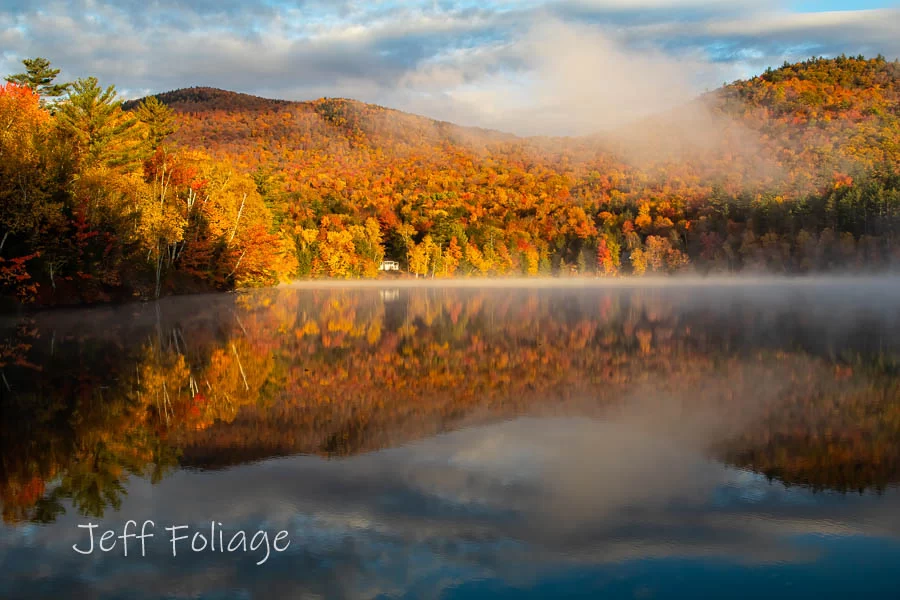 Mirror Lake in thornton  New Hampshire at dawn in fall colors