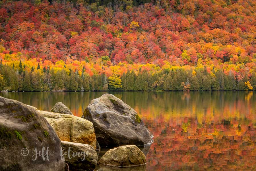 Jobs Pond in peak fall colors with a beautiful reflection