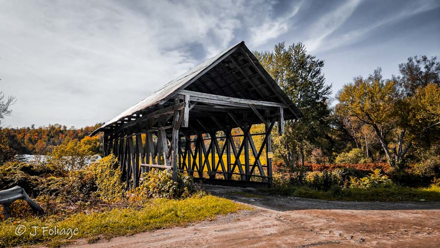 During the autumn, the fall colors help spruce this one up a bit but this is not one of the prettier covered bridges.
