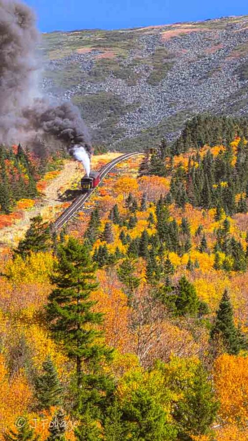 The steam engine climbs the slopes of Mount Washington in the fall colors