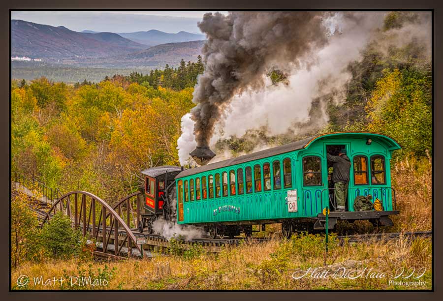 cog rail steam engine and passengers by Matt Dimaio