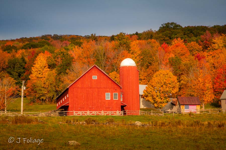 Red Barn along Route 100 near Weston Vermont with late afternoon fall colors