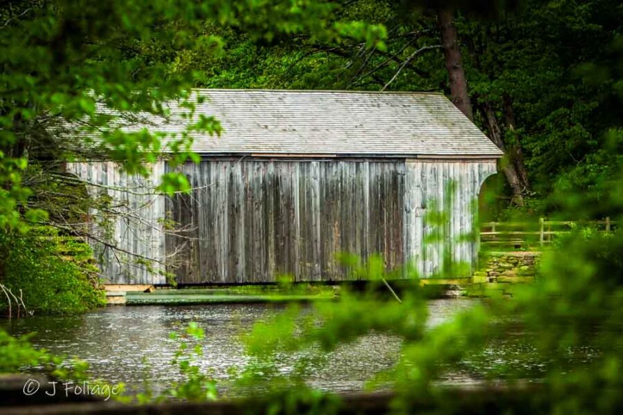 A summertime view of the Taft Covered Bridge Sturbridge